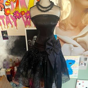 This is a standing necklace holder